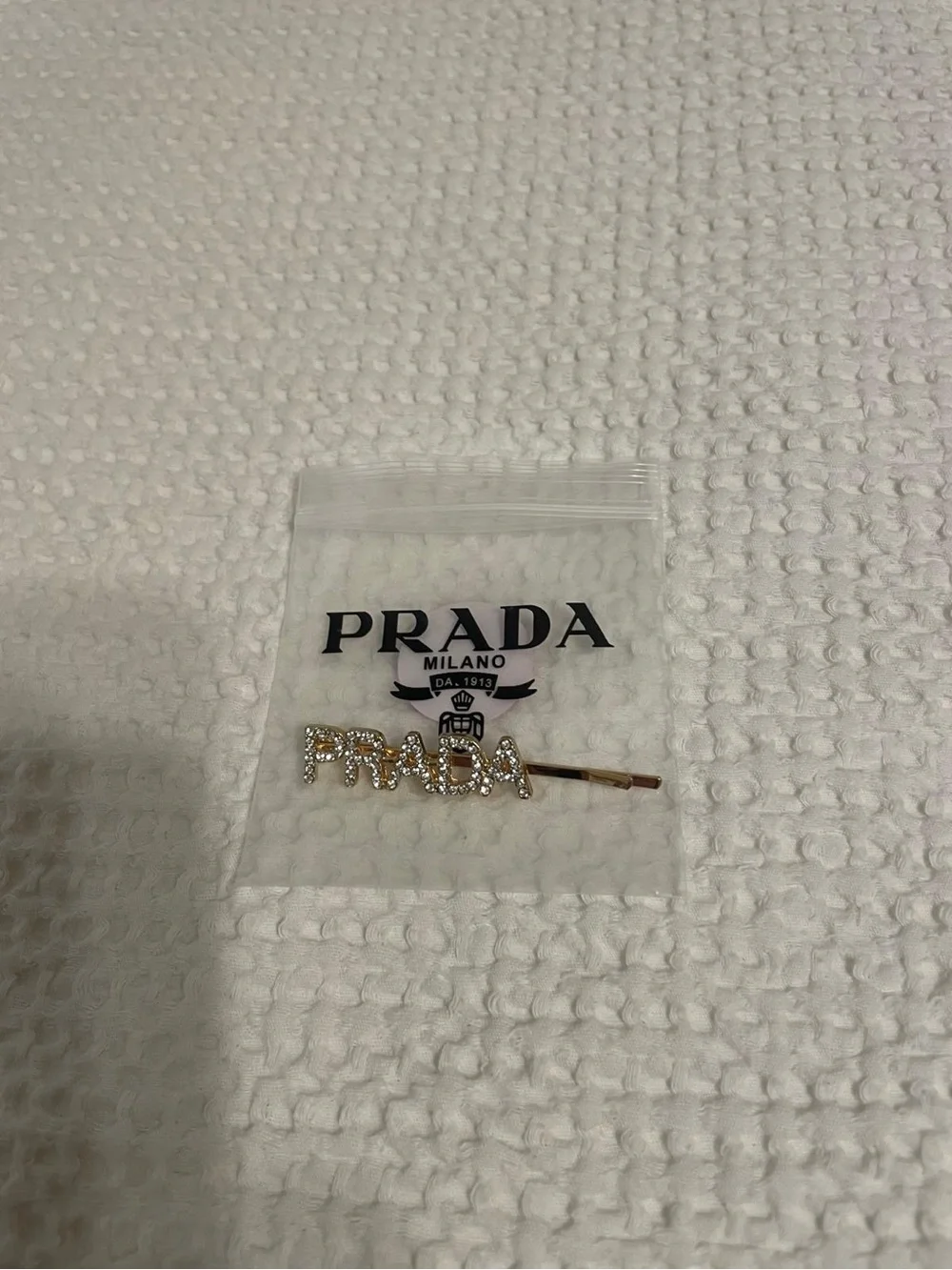 Prada Gold-Tone Crystal 'Love' Hair Pin with Pink Accent